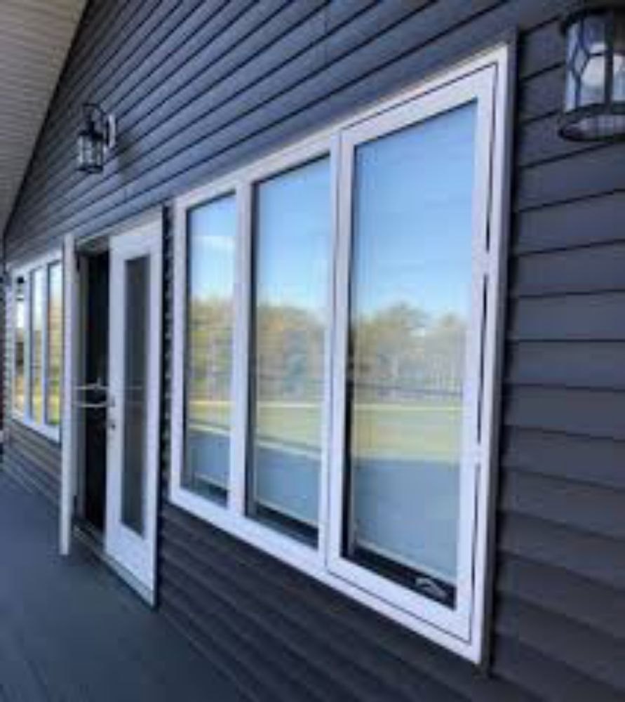 A wall of patio doors and windows cleaned inside and out - EC Services